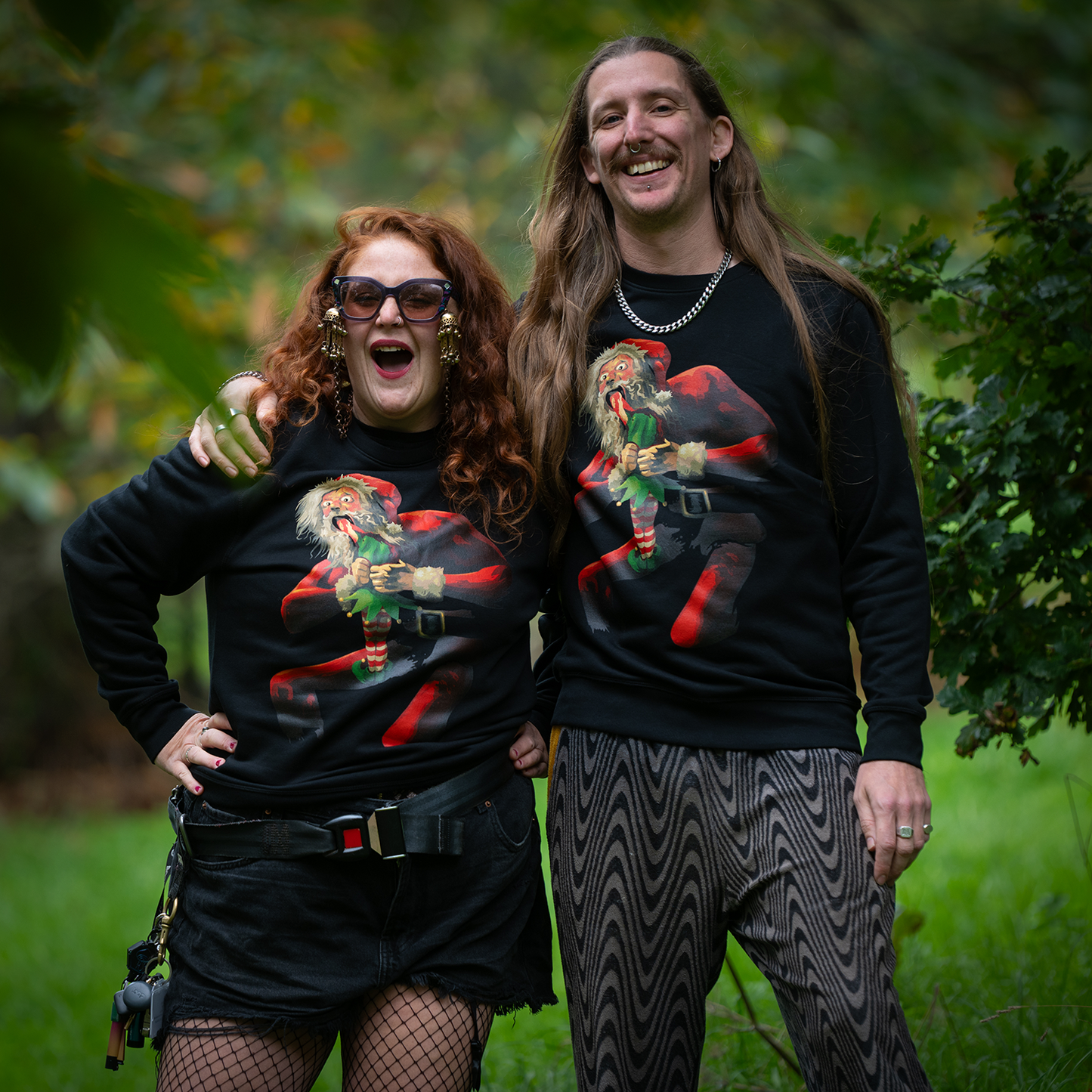 Santa Devouring An Elf - Christmas Sweatshirt